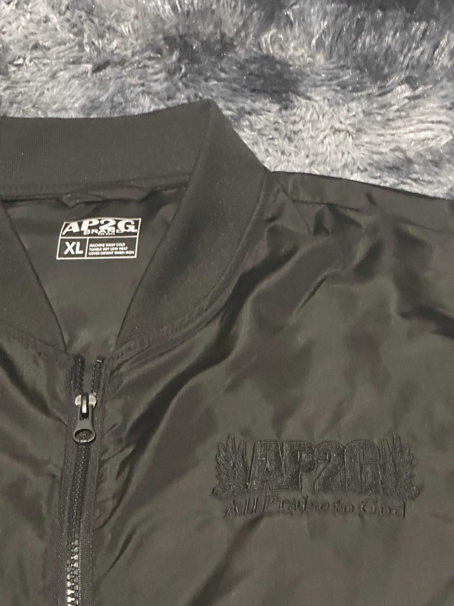 AP2G Praise Wing Bumper Jacket – Blackout Edition