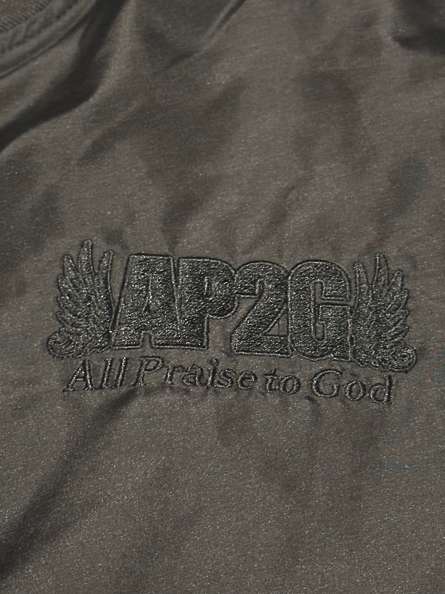 AP2G Praise Wing Bumper Jacket – Blackout Edition