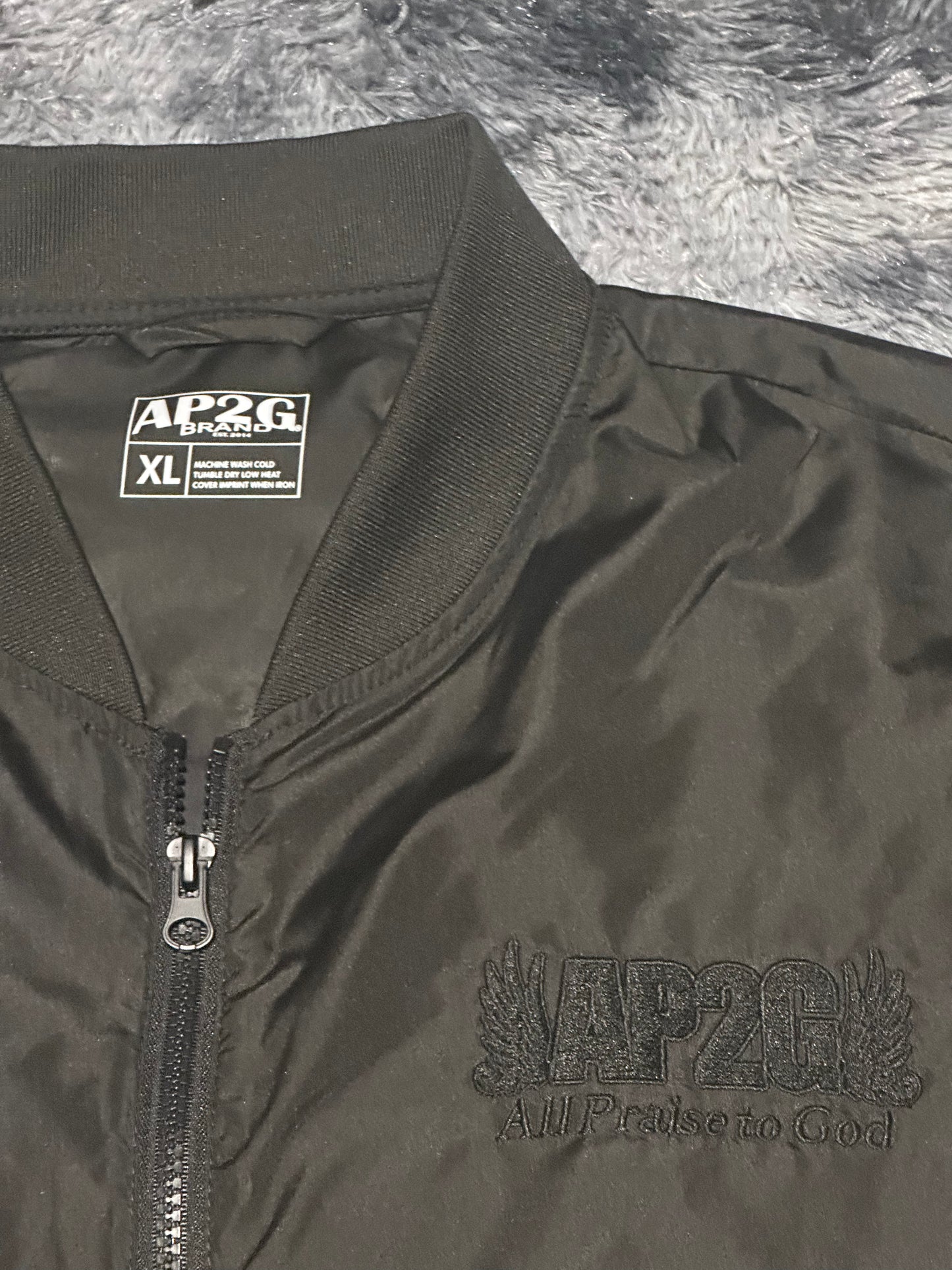 AP2G Praise Wing Bumper Jacket – Blackout Edition