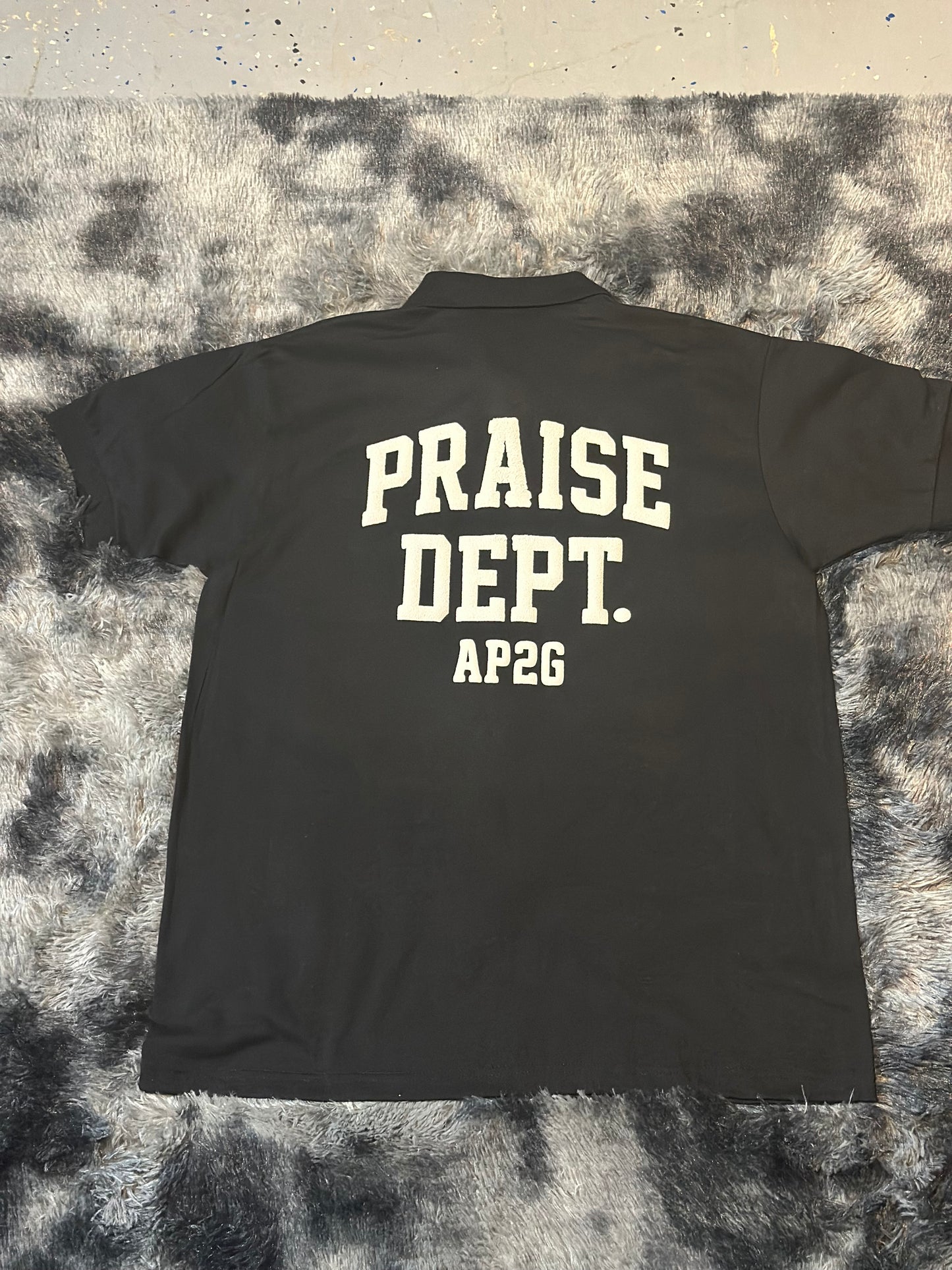 PRAISE DEPT.  Polo style shirt